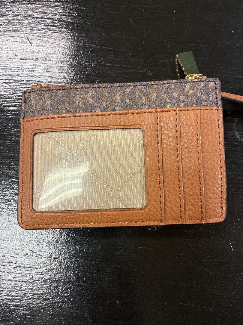 Brown michael kors wallet, XS