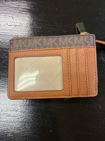 Brown michael kors wallet, XS